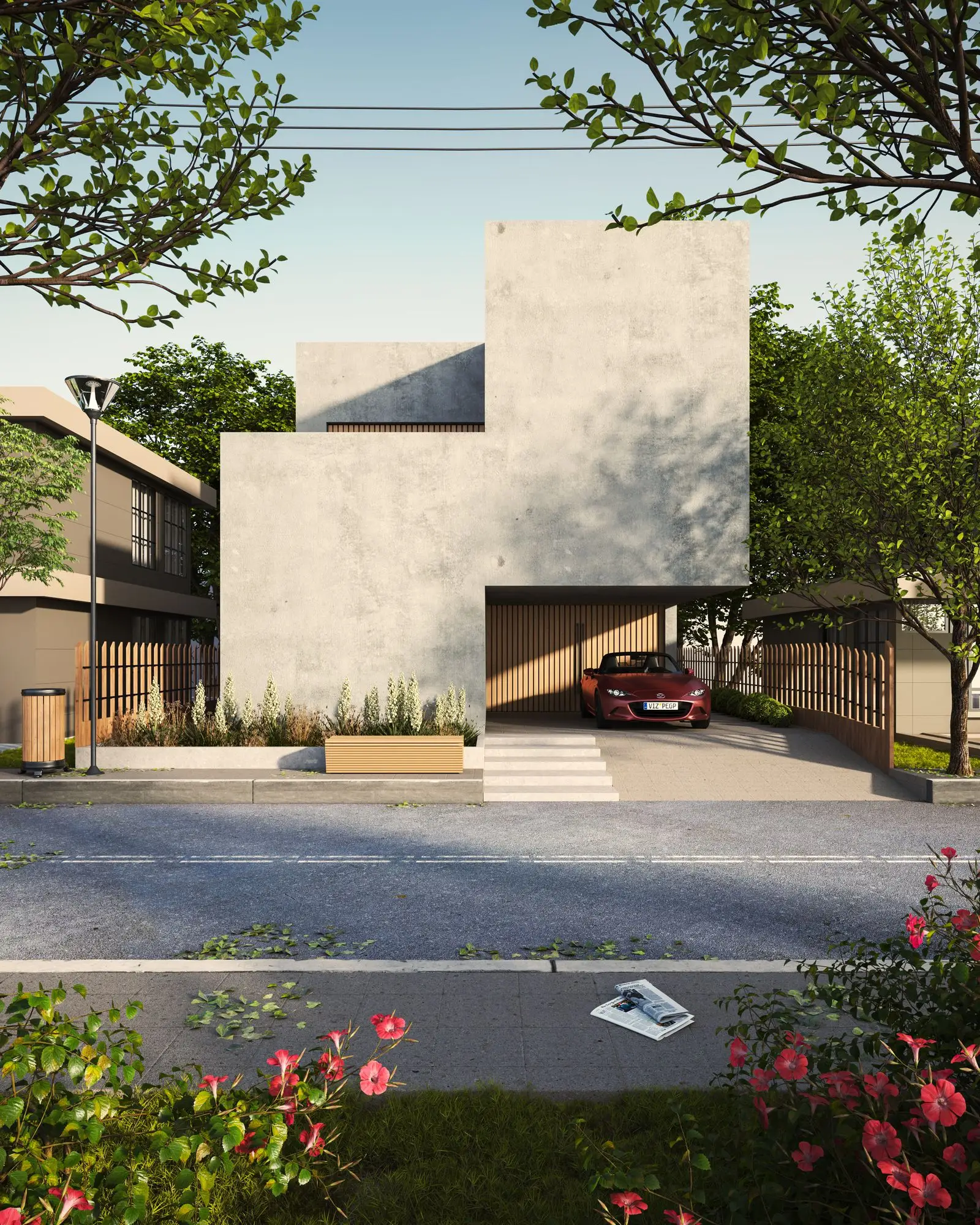 Concrete house with a garden and an open garage.