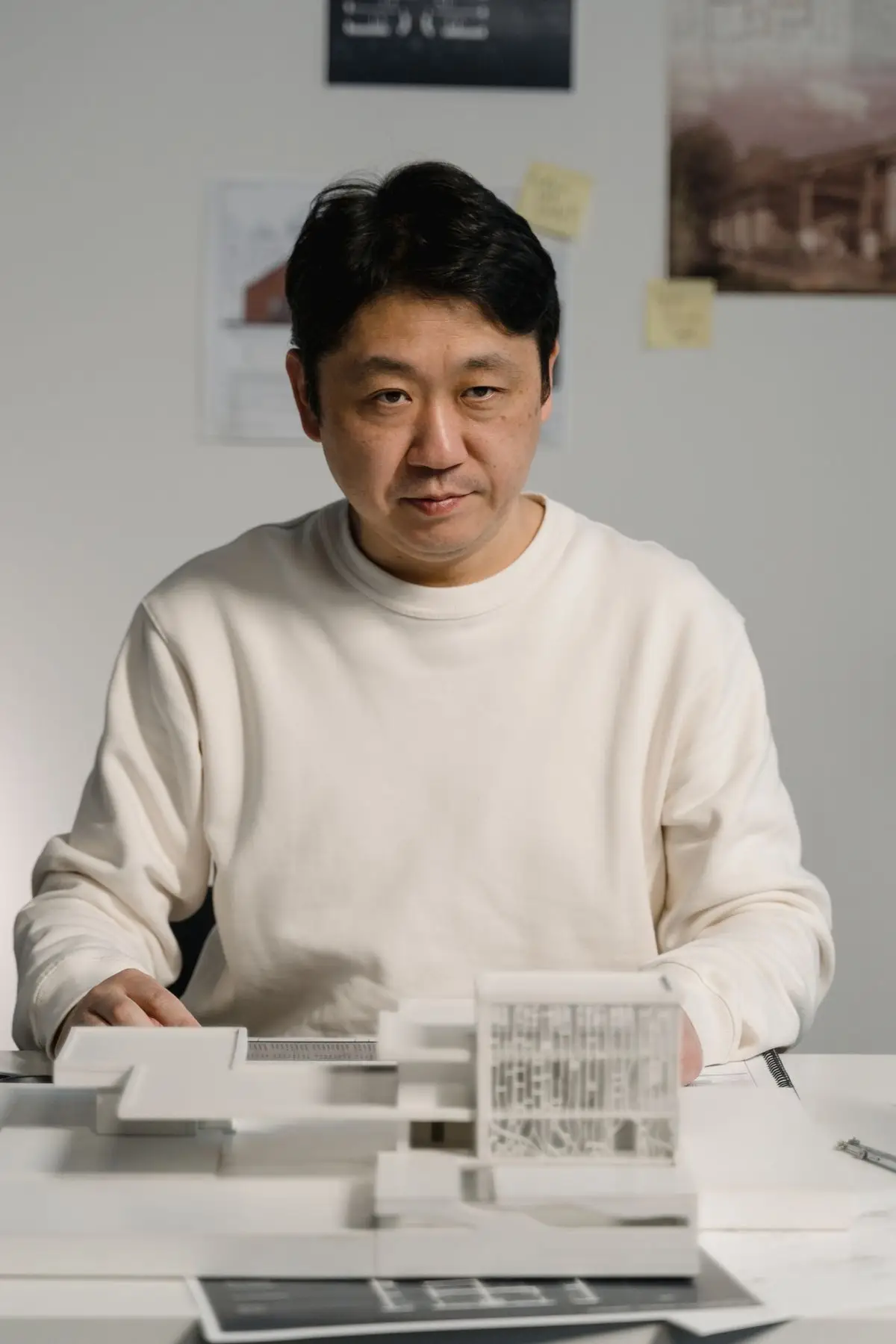 Architect working on a model in the studio.