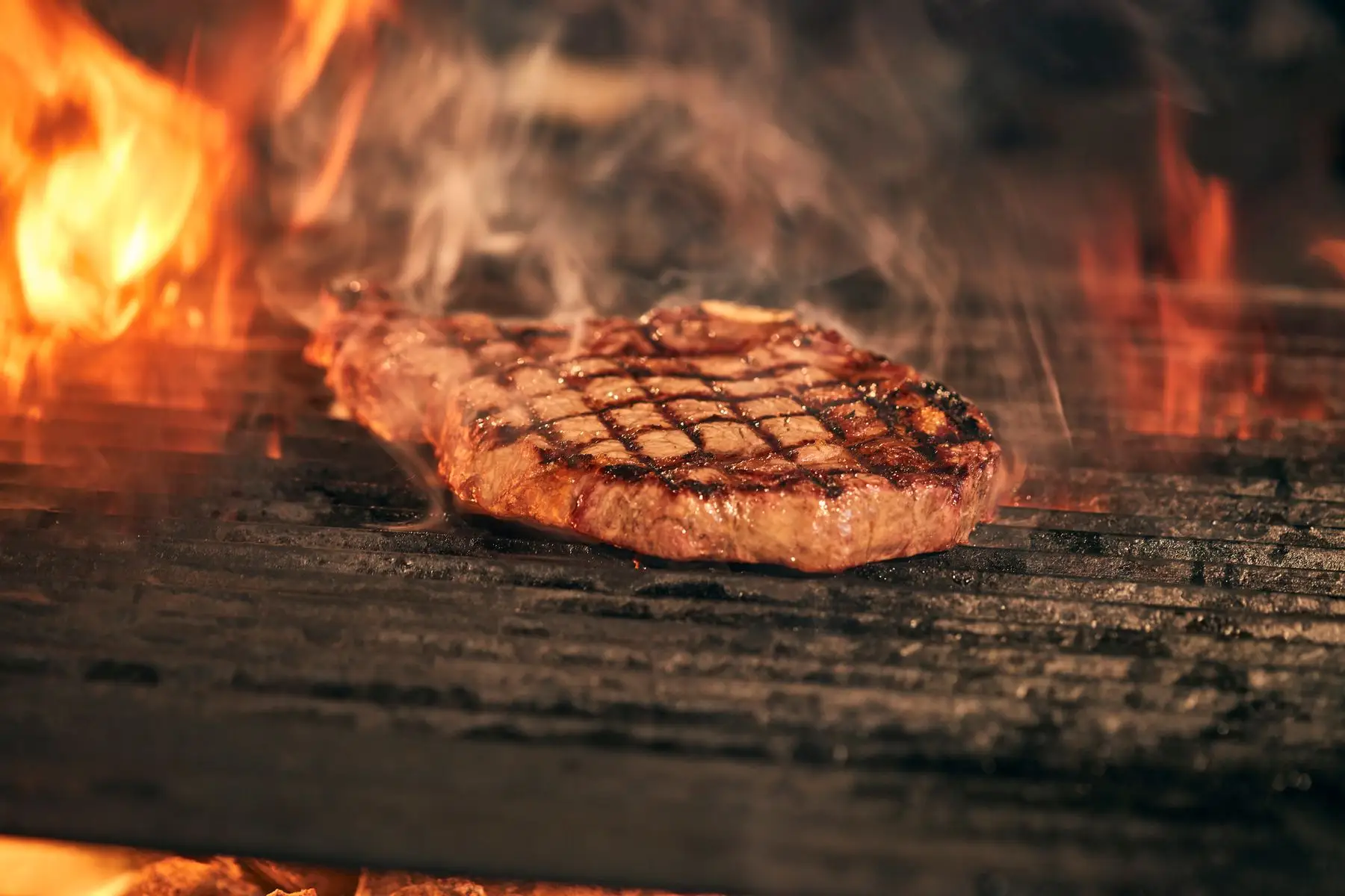 Rib eye over high flames.