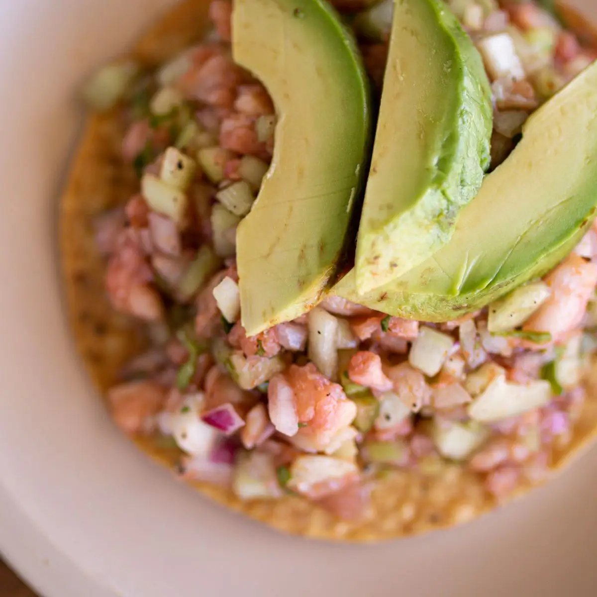 Tuna tostada with avocado.